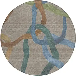 Photo of 8' Taupe Blue And Copper Round Abstract Washable Indoor Outdoor Area Rug