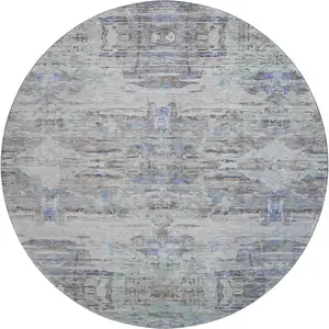 Photo of 8' Taupe Blue And Gray Abstract Washable Round Rug With UV Protection