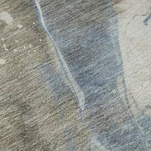 Photo of 8' Taupe Blue And Ivory Abstract Washable Area Rug With UV Protection