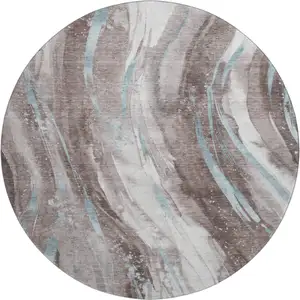 Photo of 8' Taupe Blue And Ivory Abstract Washable Round Rug With UV Protection