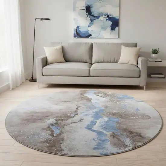 8' Taupe Blue And Ivory Abstract Washable Round Rug With UV Protection Photo 2