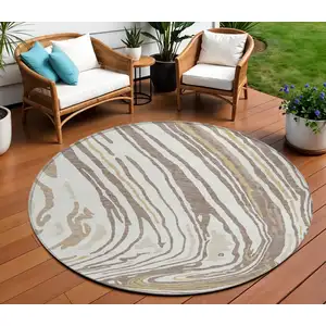 Photo of 8' Taupe Brown And Beige Round Abstract Washable Indoor Outdoor Area Rug