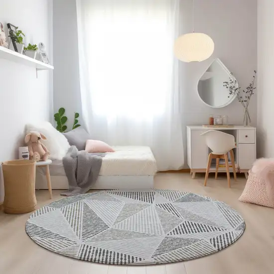 8' Taupe Brown And Beige Round Geometric Washable Indoor Outdoor Area Rug Photo 7