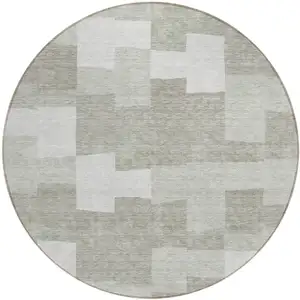 Photo of 8' Taupe Brown And Beige Round Geometric Washable Indoor Outdoor Area Rug