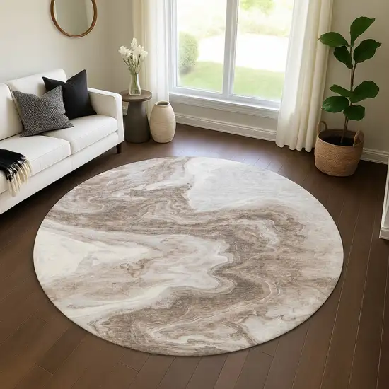 8' Taupe Brown And Ivory Abstract Washable Round Rug With UV Protection Photo 4