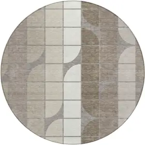 Photo of 8' Taupe Brown And Ivory Round Geometric Washable Indoor Outdoor Area Rug