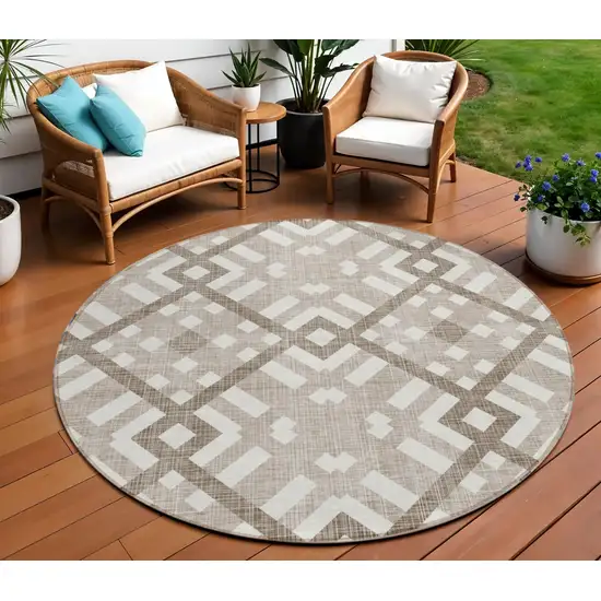 8' Taupe Brown And Ivory Round Geometric Washable Indoor Outdoor Area Rug Photo 1