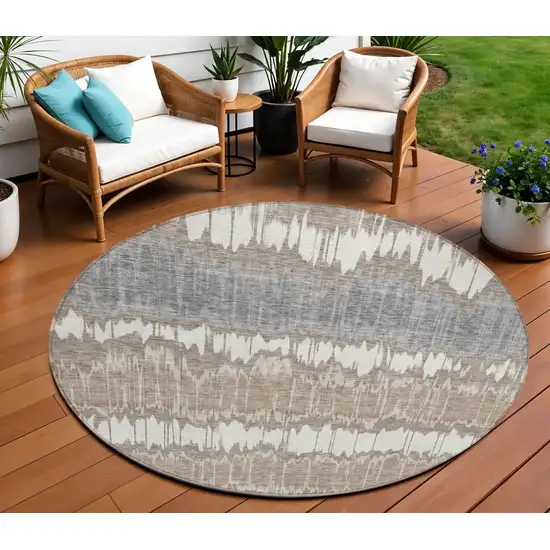8' Taupe Brown And Ivory Round Striped Washable Indoor Outdoor Area Rug Photo 1