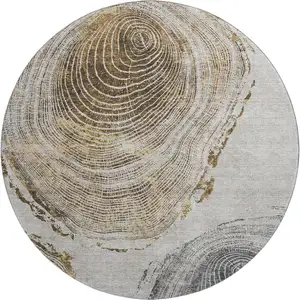 Photo of 8' Taupe Brown And Ivory Woodland Lodge Washable Round Rug With UV Protection