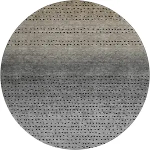 Photo of 8' Taupe Charcoal And Gray Abstract Washable Round Rug With UV Protection