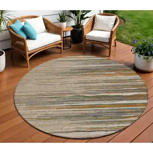 Photo of 8' Taupe Copper And Green Round Striped Washable Indoor Outdoor Area Rug