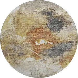 Photo of 8' Taupe Gold And Blue Abstract Washable Round Rug With UV Protection