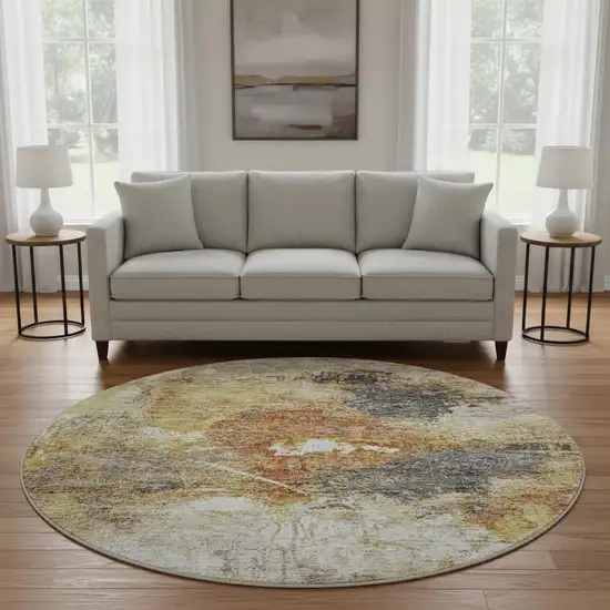 8' Taupe Gold And Blue Abstract Washable Round Rug With UV Protection Photo 2