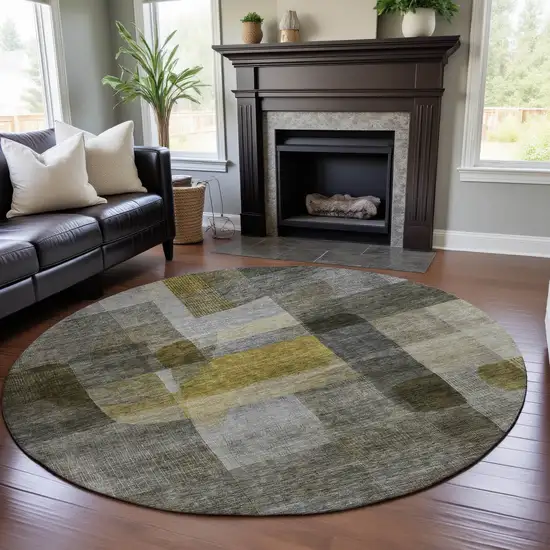 8' Taupe Gold And Gray Abstract Washable Round Rug With UV Protection Photo 4