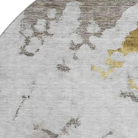8' Taupe Gold And Ivory Abstract Washable Round Rug With UV Protection Photo 3