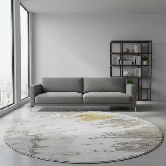 8' Taupe Gold And Ivory Abstract Washable Round Rug With UV Protection Photo 2