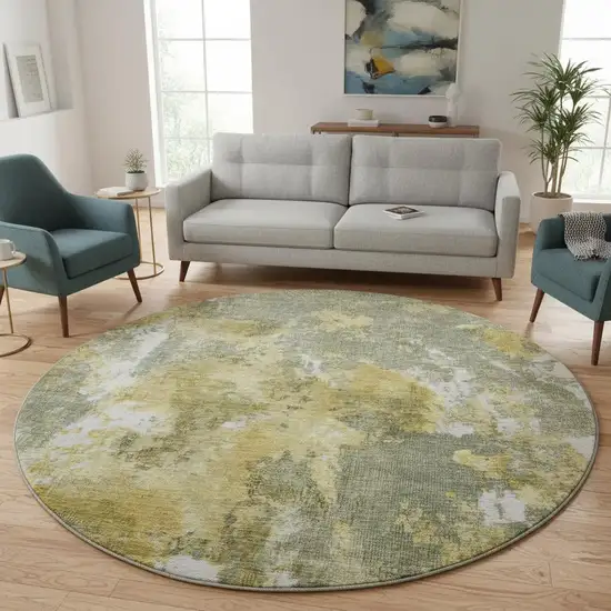 8' Taupe Gold And Ivory Abstract Washable Round Rug With UV Protection Photo 2