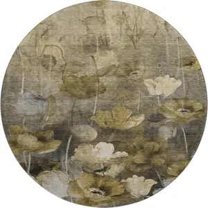 Photo of 8' Taupe Gold And Ivory Floral Washable Round Rug With UV Protection