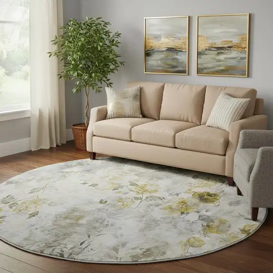 8' Taupe Gold And Ivory Floral Washable Round Rug With UV Protection Photo 1