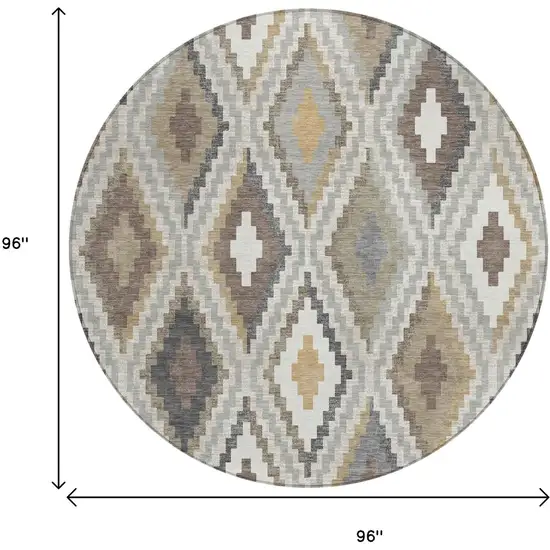 8' Taupe Gold And Ivory Round Geometric Washable Indoor Outdoor Area Rug Photo 3