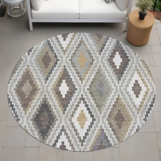8' Taupe Gold And Ivory Round Geometric Washable Indoor Outdoor Area Rug Photo 9