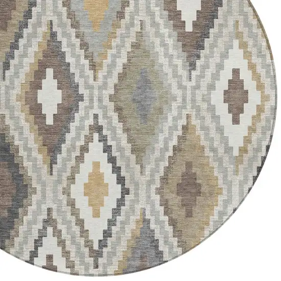 8' Taupe Gold And Ivory Round Geometric Washable Indoor Outdoor Area Rug Photo 7