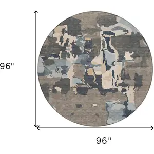 Photo of 8' Taupe Gray And Beige Round Abstract Washable Indoor Outdoor Area Rug