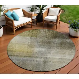 Photo of 8' Taupe Gray And Black Round Abstract Washable Indoor Outdoor Area Rug