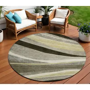 Photo of 8' Taupe Gray And Black Round Abstract Washable Indoor Outdoor Area Rug