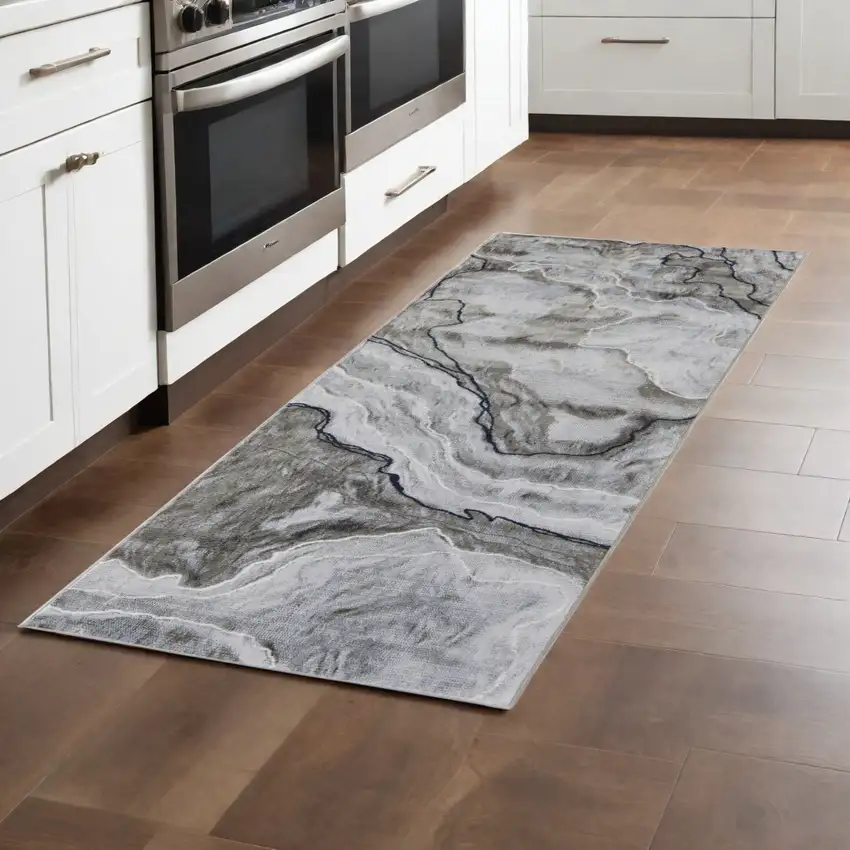 8' Taupe Gray And Blue Abstract Power Loom Stain Resistant Runner Rug Photo 1