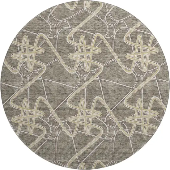 8' Taupe Gray And Gold Geometric Washable Round Rug With UV Protection Photo 1
