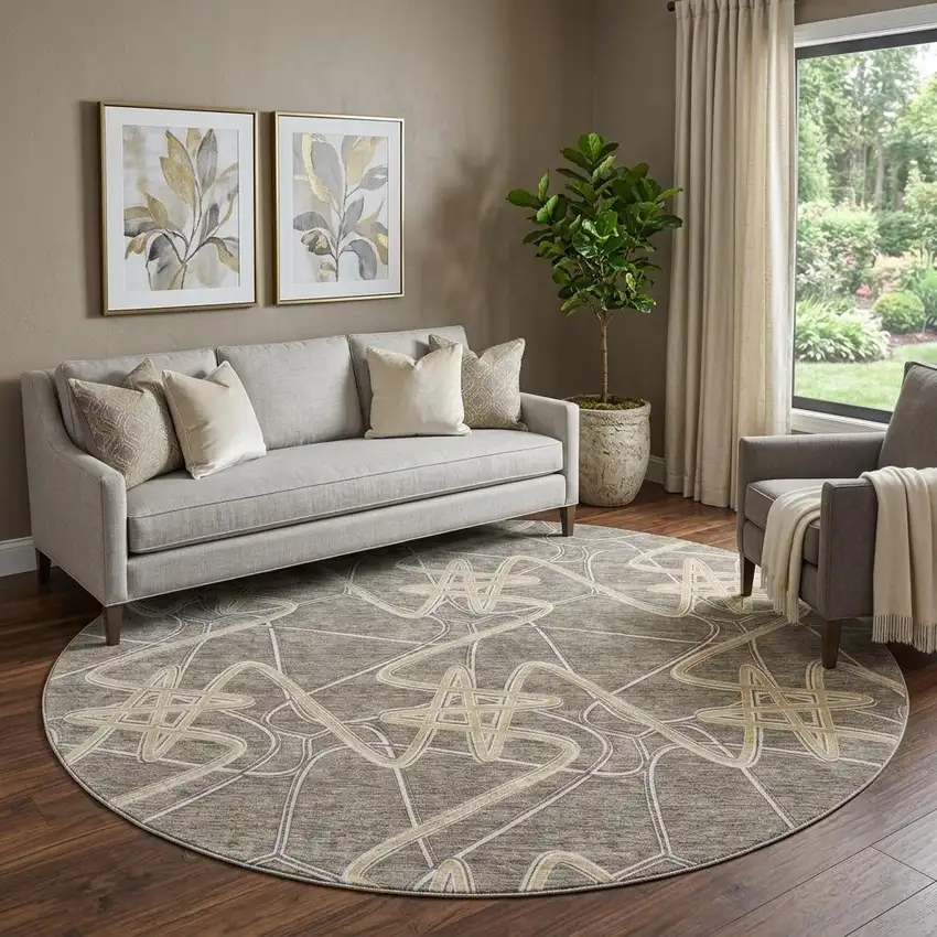 8' Taupe Gray And Gold Geometric Washable Round Rug With UV Protection Photo 1