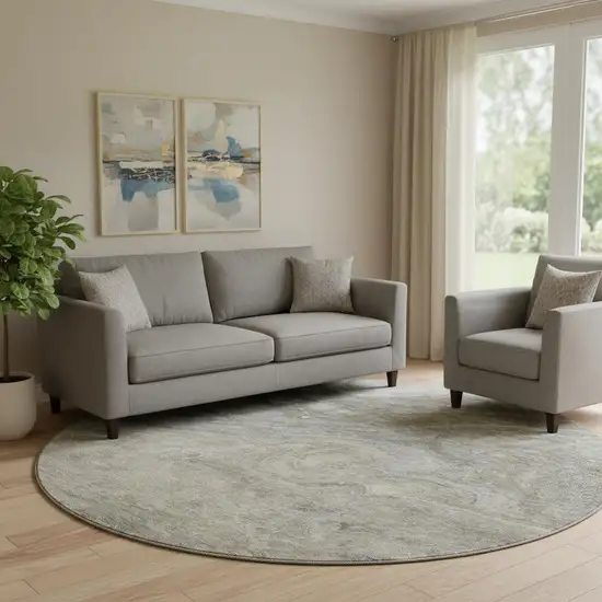 8' Taupe Gray And Ivory Abstract Washable Round Rug With UV Protection Photo 1