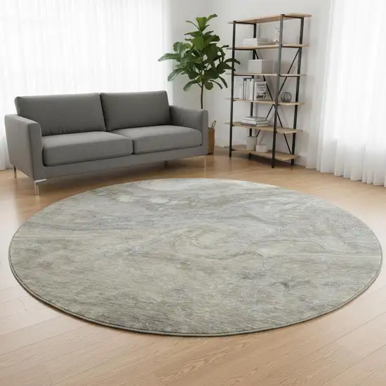 8' Taupe Gray And Ivory Abstract Washable Round Rug With UV Protection Photo 2