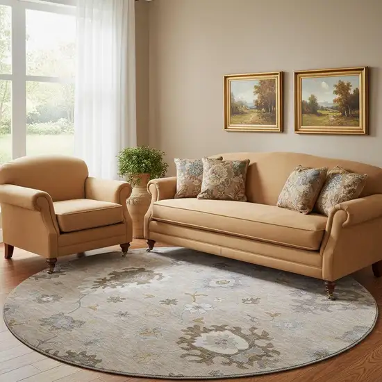 8' Taupe Gray And Ivory Floral Medallion Washable Round Rug With UV Protection Photo 1