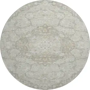 Photo of 8' Taupe Gray And Ivory Medallion Washable Round Rug With UV Protection