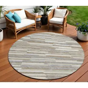 Photo of 8' Taupe Gray And Ivory Round Striped Washable Indoor Outdoor Area Rug