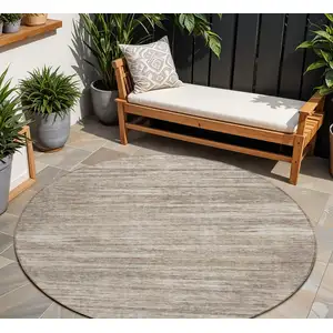 Photo of 8' Taupe Gray And Ivory Round Striped Washable Indoor Outdoor Area Rug