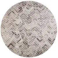 Photo of 8' Taupe Gray And Ivory Round Wool Geometric Tufted Handmade Area Rug