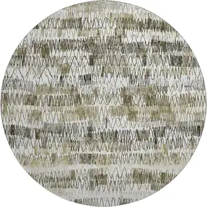Photo of 8' Taupe Gray And Ivory Striped Washable Round Rug With UV Protection