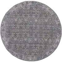 Photo of 6' Taupe Gray And Orange Round Floral Power Loom Area Rug