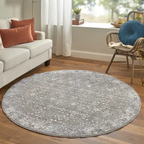 6' Taupe Gray And Orange Round Floral Power Loom Area Rug Photo 3