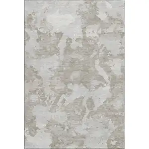 Photo of 8' Taupe Gray And Silver Abstract Washable Area Rug With UV Protection