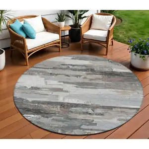 Photo of 8' Taupe Gray And Silver Round Abstract Washable Indoor Outdoor Area Rug
