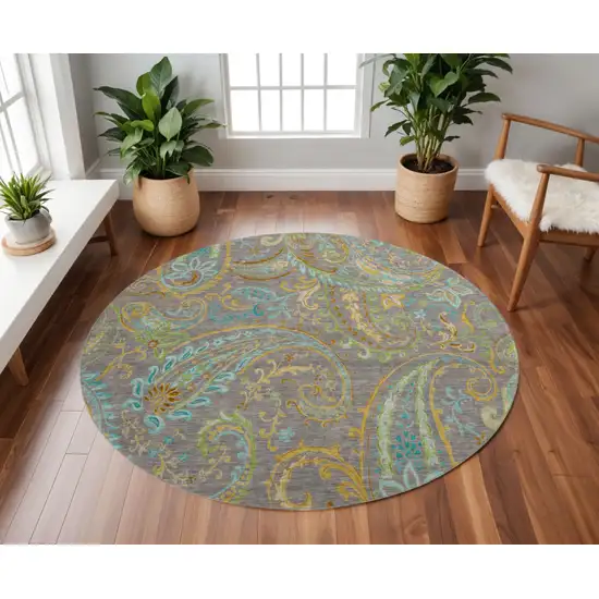 8' Taupe Green And Blue Paisley Washable Round Rug With UV Protection Photo 2