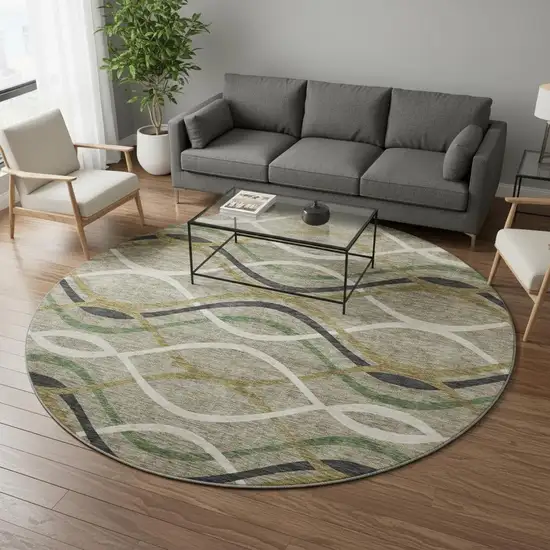 8' Taupe Green And Gold Abstract Washable Round Rug With UV Protection Photo 2