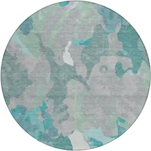 Photo of 8' Taupe Green And Ivory Round Abstract Washable Indoor Outdoor Area Rug