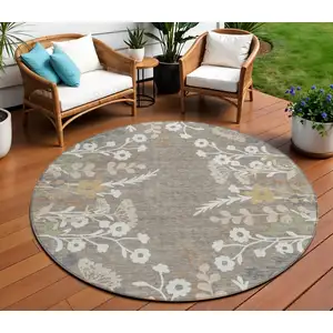 Photo of 8' Taupe Green And Ivory Round Floral Washable Indoor Outdoor Area Rug