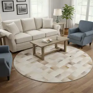 Photo of 8' Taupe Ivory And Beige Patchwork Washable Round Rug With UV Protection