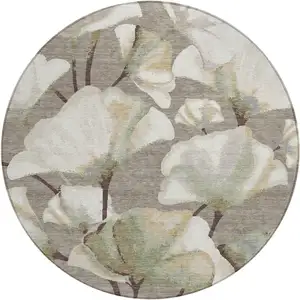 Photo of 8' Taupe Ivory And Beige Round Botanical Leaves Washable Indoor Outdoor Area Rug